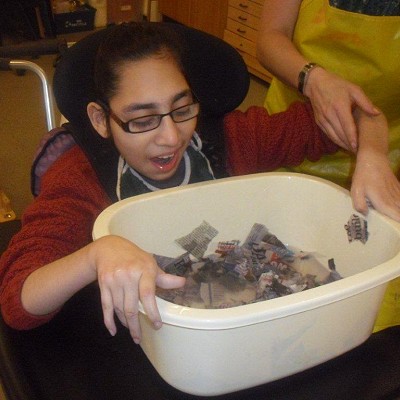 Recycling old news into hand crafted paper