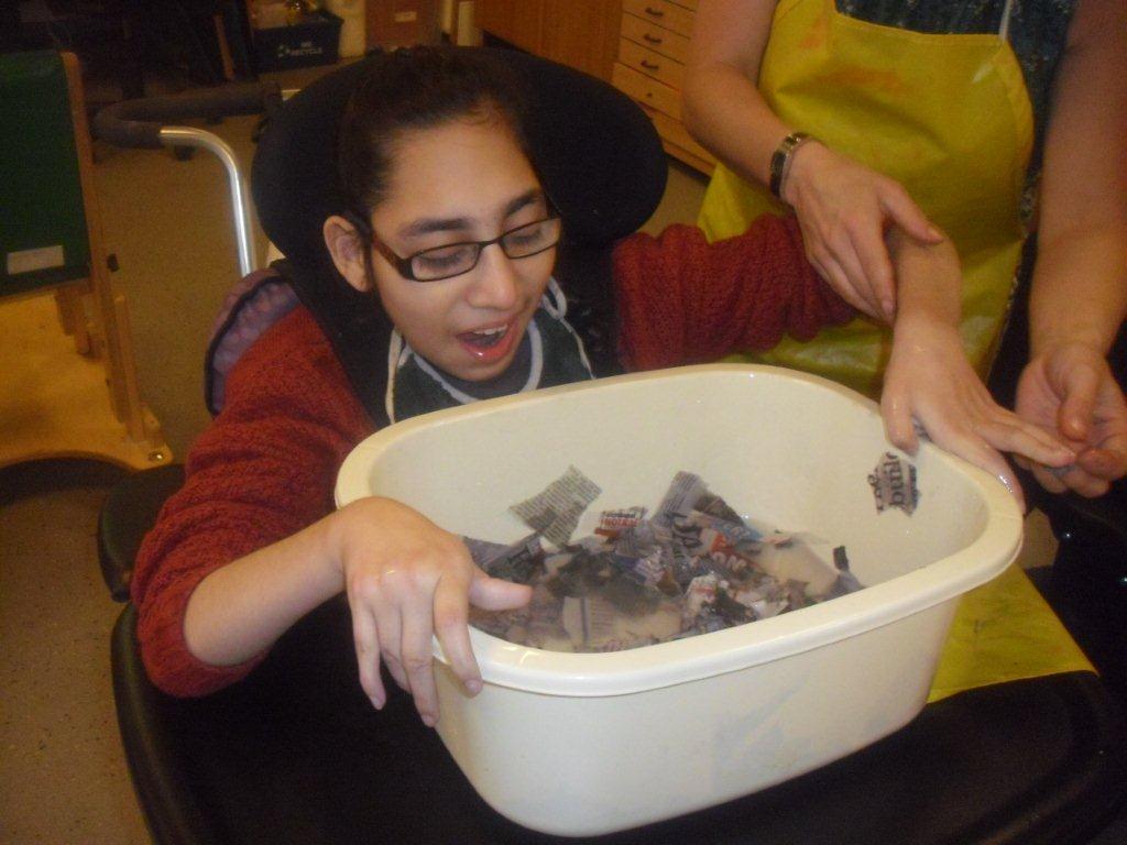 Recycling old news into hand crafted paper