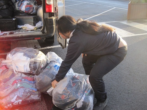 loading bags into the van