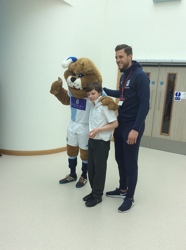 Rover and Jayson with one of our students.